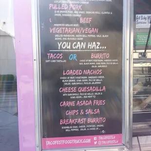 a menu on a food truck