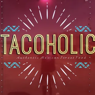 a person standing in front of a food truck