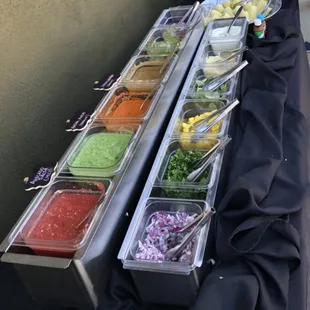 Salsas, condiments, corn, beans, rice.