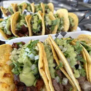 Tacos! Hand made corn tortillas choice of meat cokes with onions cilantro and guac