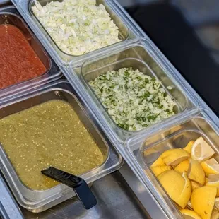 a variety of condiments on a table