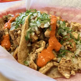 a close up of a taco in a basket