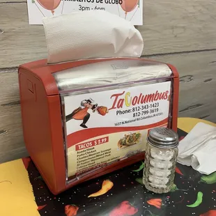 a tissue dispenser and a napkin dispenser