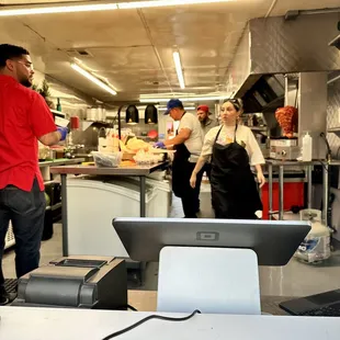 a man working in a commercial kitchen