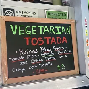 a menu on the side of the truck