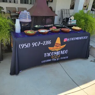 Our setup tables for our condiments!