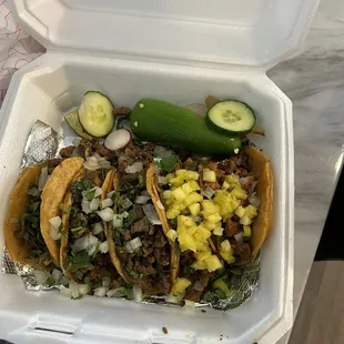 Carne asada and al pastor tacos