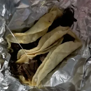 a taco wrapped in foil