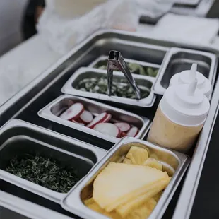 a tray of condiments and condiments