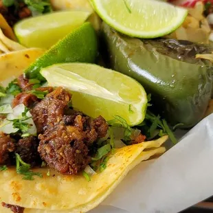 a plate of tacos on a table