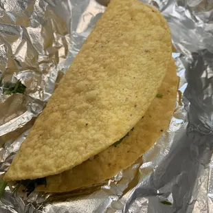 two tortillas on tin foil