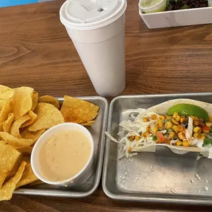 One Taco Combo with a Seared Tofu taco and chips &amp; queso.