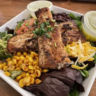 Mexican Cobb salad with mahi mahi and citrus vinaigrette.