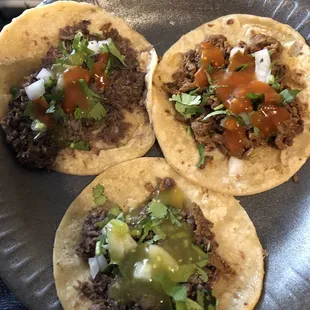three tacos on a plate