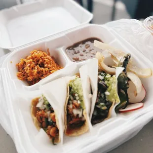 Platos. Comes with 3 tacos, rice, and beans. Second time in a row.