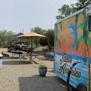 Large parking area it's shaded seating.