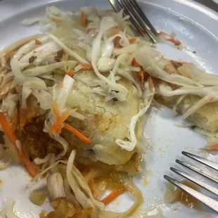 Pupusaa. Yummy. One cheese one mixture
