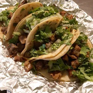 Fajitas and crispy tripas on corn. Still the best tacos!