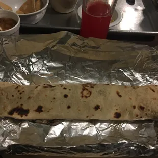 a tortilla wrapped in aluminum foil