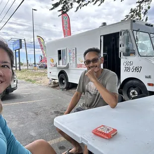 two people sitting at a table