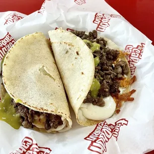 Asada Tacos with quesadilla cheese and mild salsa!