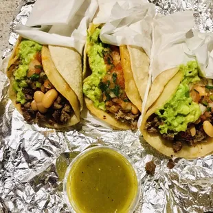 (Outside) Carne Asada Tacos (middle) Pork Taco