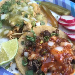My favorite tacos in SJ. one chicken one carne love the spicy salsas
