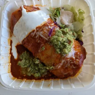Burrito supreme with guacamole, sour cream+ enchilada sauce! Yeah! :)