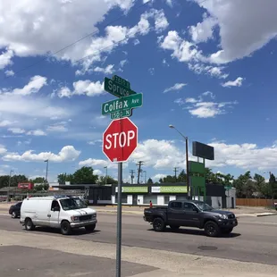 a stop sign and a van