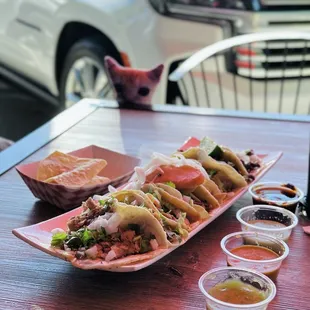 8 tacos - al pastor, carne asada, pollo, y suadero