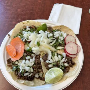 Top left: pastor, top right: cabeza, bottom two: carne asada