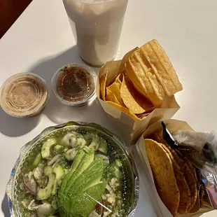 Aguachiles and horchata. Side of beans and salsa came along with it 3