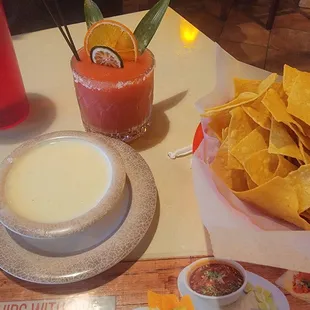 Chips, queso and a frozen margarita.