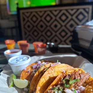 4 birria taco with consomé plate