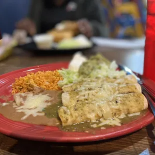 Enchiladas beans and rice. Very good flavor and huge plate.