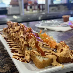 a sushi roll on a plate