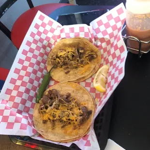 Some weird ass tacos  with cheese my weird a** friend ordered #lengua