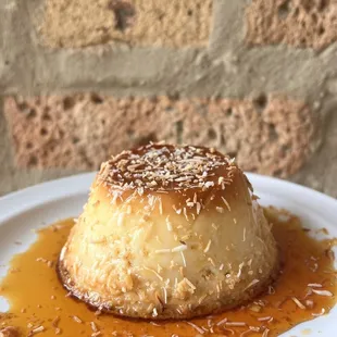 Flan de Coco with coconut shavings. Doesn&apos;t get better than this!