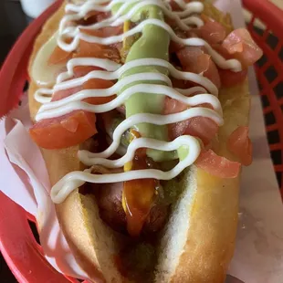 a hot dog with toppings