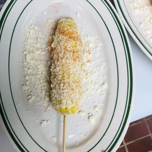 a corn on a stick