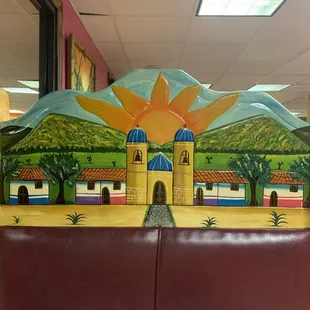 Booths have artsy Mexican themed headrests