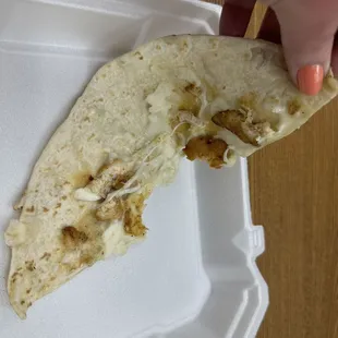 There is very little chicken on my chicken quesadilla