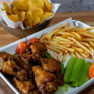 Homemade Boneless Wings: Juicy boneless wings in Buffalo, Mango Habanero, or BBQ sauce for bold, irresistible flavor.