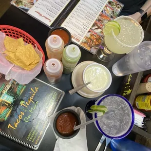 Margaritas and chips and queso + 3 kinds of salsa