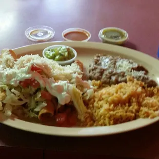 4 chicken taquitos with rice and beans