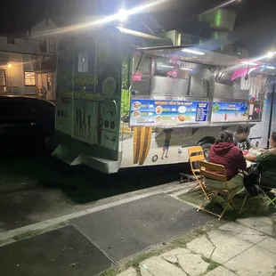 Front of truck next to produce market