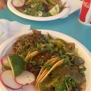 two plates of tacos