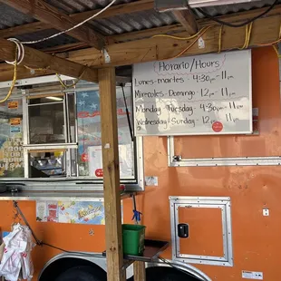 Hours and window to the kitchen