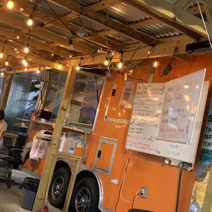 a food truck parked in a garage