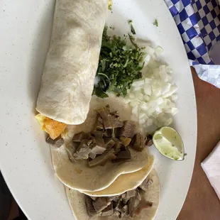 One potato-egg-cheese and 2 lengua tacos